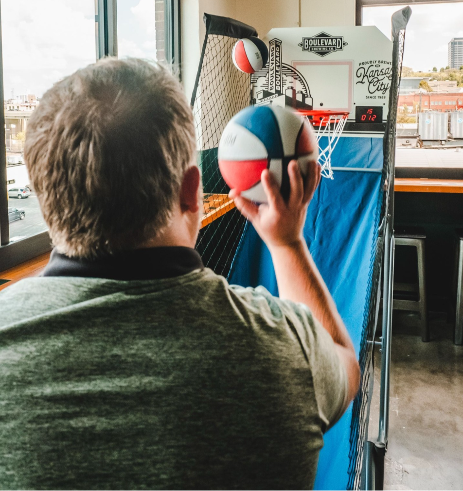 Corporate Team-Building Benefits with a Pop-A-Shot Game